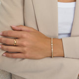 Emerald Bezel E/W Tennis Bracelet