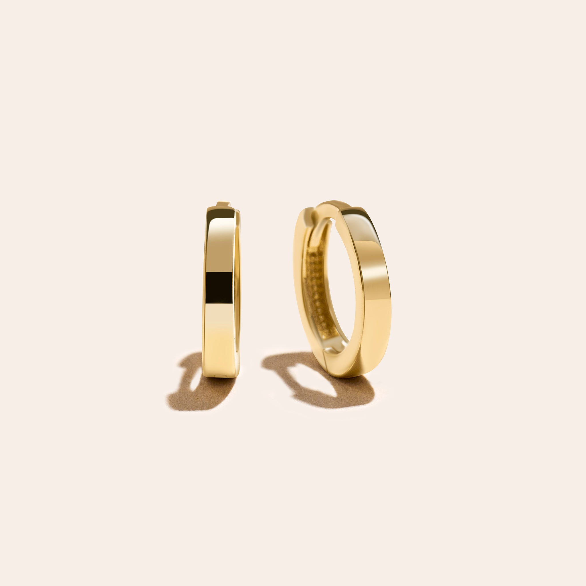 14k yellow gold tube huggie earring